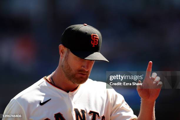 Alex Cobb of the San Francisco Giants reacts to the crowd after he was taken out of the game in the sixth inning against the Colorado Rockies at...
