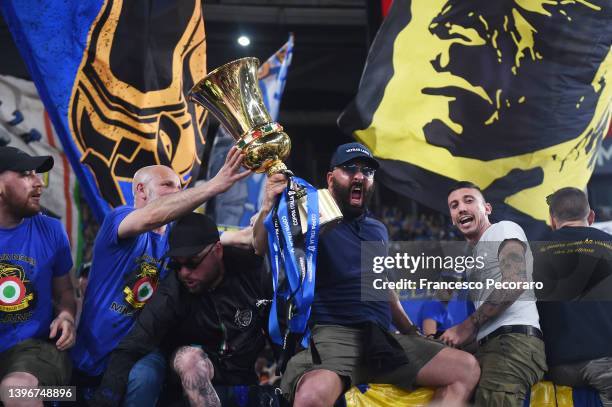 Internazionale fans celebrate with the Coppa Italia trophy following victory in the Coppa Italia Final match between Juventus and FC Internazionale...