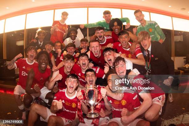 The Manchester United U18s squad celebrate in the dressing room after the FA Youth Cup Final between Manchester United U18s and Nottingham Forest...