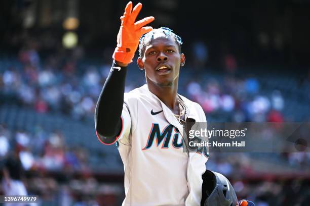 Jazz Chisholm Jr of the Miami Marlins gestures to the fans after hitting a three run home run during the ninth inning off of Mark Melancon of the...