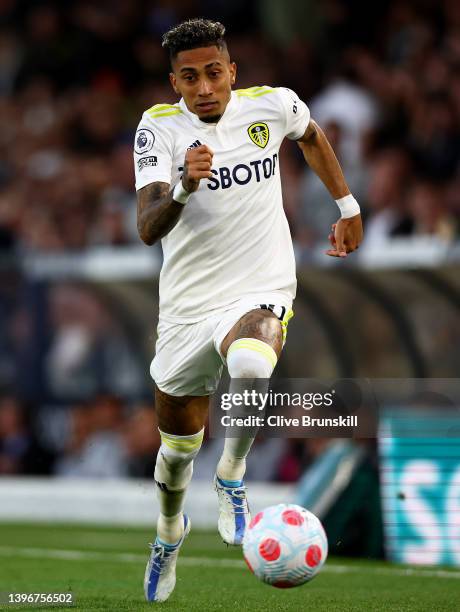 Raphinha of Leeds United runs with the ball during the Premier League match between Leeds United and Chelsea at Elland Road on May 11, 2022 in Leeds,...