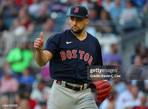 Nathan Eovaldi of the Boston Red Sox reacts after closing out the first inning against the Atlanta Braves at Truist Park on May 11, 2022 in Atlanta,...