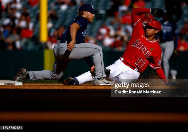 Shohei Ohtani of the Los Angeles Angels steals second base against Taylor Walls of the Tampa Bay Rays in the fourth inning at Angel Stadium of...