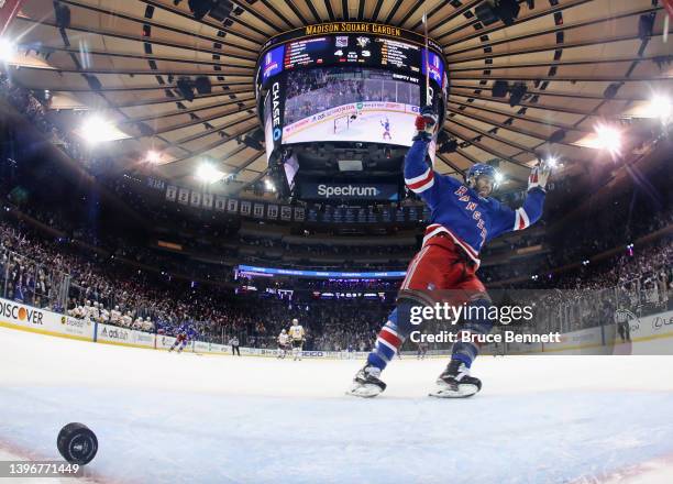 Kevin Rooney of the New York Rangers celebrates an empty net goal by Ryan Lindgren against the Pittsburgh Penguins in Game Five of the First Round of...