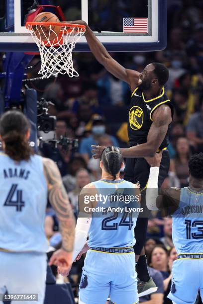 Draymond Green of the Golden State Warriors dunks the ball against the Memphis Grizzlies during the first quarter in Game Five of the 2022 NBA...