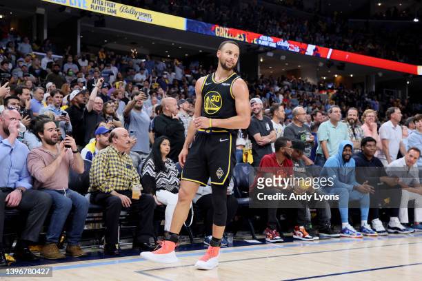 Stephen Curry of the Golden State Warriors reacts against the Memphis Grizzlies during the third quarter in Game Five of the 2022 NBA Playoffs...