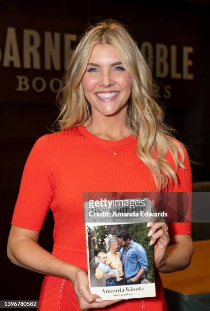 Television personality Amanda Kloots celebrates her new book "Live Your Life: My Story of Loving and Losing Nick Cordero" with actress Kelly Rizzo at...