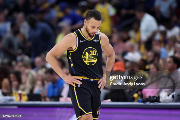 Stephen Curry of the Golden State Warriors reacts against the Memphis Grizzlies during the third quarter in Game Five of the 2022 NBA Playoffs...