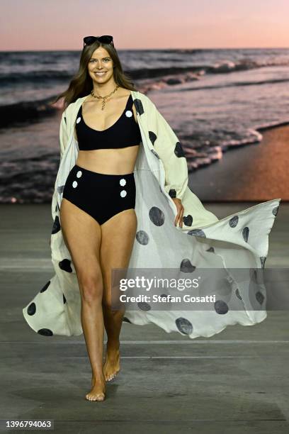 Robyn Lawley walks the runway in a design by SAINT SOMEBODY during The Curve Edit show during Afterpay Australian Fashion Week 2022 Resort '23...