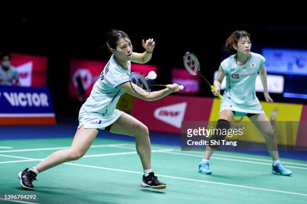 Yuki Fukushima and Sayaka Hirota of Japan compete in the Women's Doubles match against Hsu Ya Ching and Lin Wan Ching of Chinese Taipei during day...