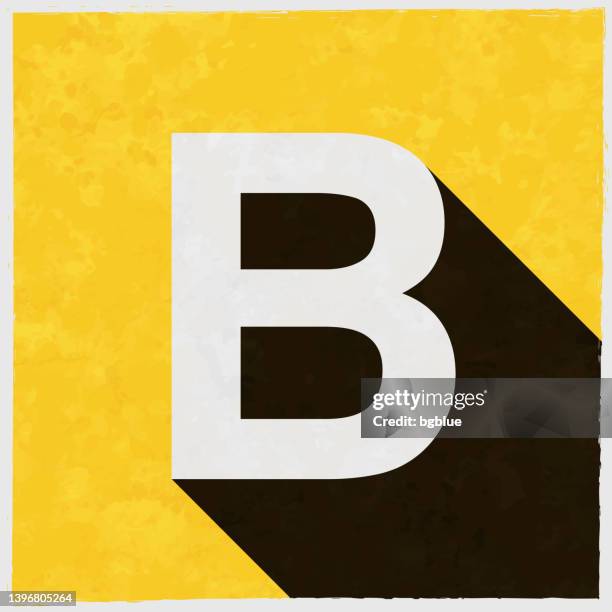 letter b. icon with long shadow on textured yellow background - letter b stock illustrations