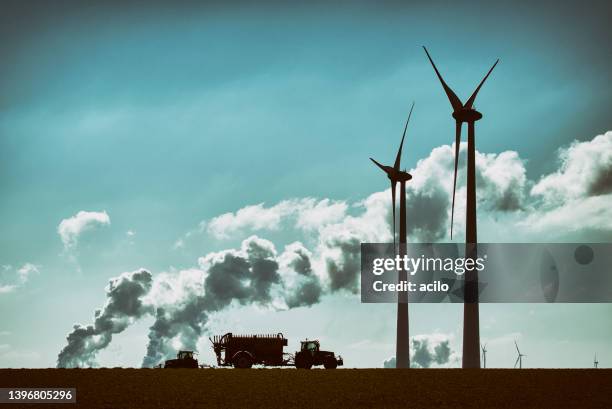 wind energy versus coal fired power plants - greenhouse gas stock pictures, royalty-free photos & images