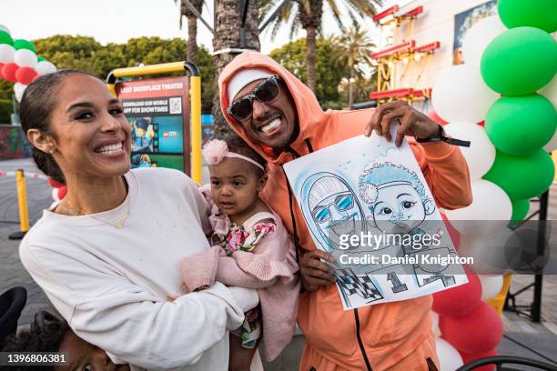 Brittany Bell, Powerful Queen Cannon, and Nick Cannon pose for a photo at LEGOLAND California on May 11, 2022 in Carlsbad, California.