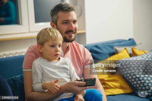 Family Watching Tv Cartoon Photos and Premium High Res Pictures - Getty Images Family Watching Tv Cartoon Photos and Premium High Res Pictures - Getty Images