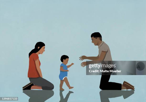 parents watching baby son take first steps - babys stock-grafiken, -clipart, -cartoons und -symbole