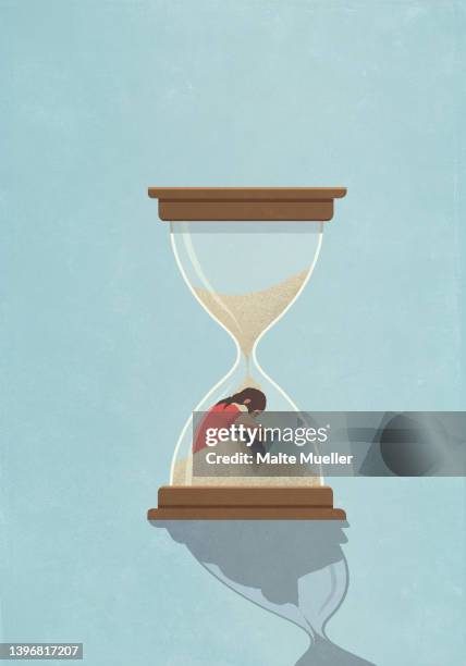 bildbanksillustrationer, clip art samt tecknat material och ikoner med sand falling over woman inside hourglass - anxiety