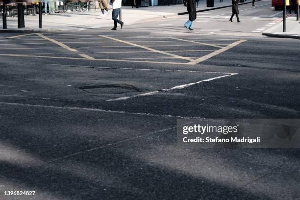 square with people partial section - road marking stock pictures, royalty-free photos & images
