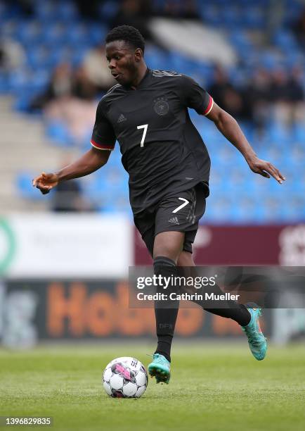 Kwadwo Baah of Germany runs with the ball during the international friendly match between Denmark U19 and Germany U19 at DS Arena on May 11, 2022 in...