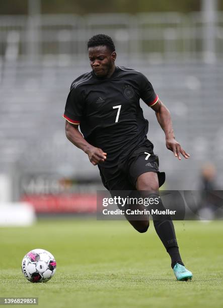 Kwadwo Baah of Germany runs with the ball during the international friendly match between Denmark U19 and Germany U19 at DS Arena on May 11, 2022 in...