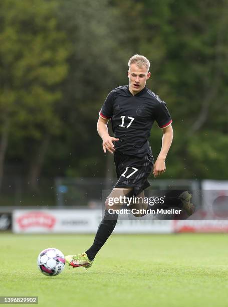 Jannic Ehlers of Germany runs with the ball during the international friendly match between Denmark U19 and Germany U19 at DS Arena on May 11, 2022...