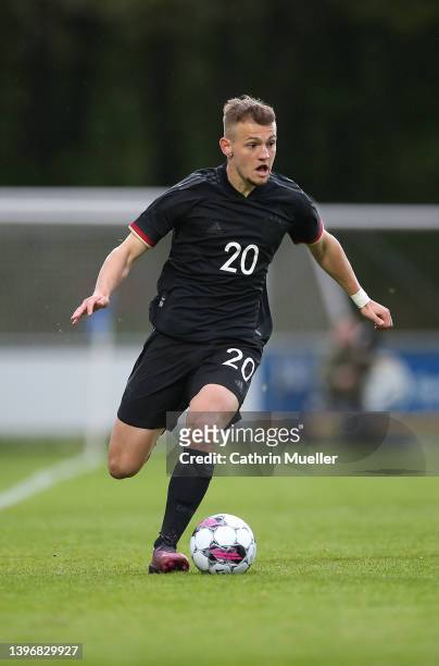 Kushtrim Asallari of Germany runs with the ball during the international friendly match between Denmark U19 and Germany U19 at DS Arena on May 11,...