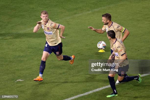 Jordan Elsey of the Jets celebrates with team mates after scoring a goal during the Australia Cup Playoff match between Newcastle Jets and Perth...