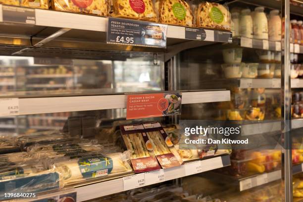 Items containing chicken are removed from shelves in a branch of Marks and Spencer on May 12, 2022 in London, England. Supermarkets and Cafes have...