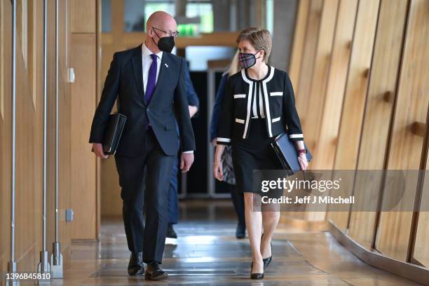 Scotland's First Minister Nicola Sturgeon arrives to attend First Minster's Questions at the Scottish Parliament with John Swinney Deputy First...