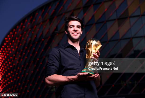Kaka, FIFA World Cup Trophy Tour Ambassador poses for picture with the Original FIFA World Cup Trophy at Coca-Cola Arena on May 11, 2022 in Dubai,...