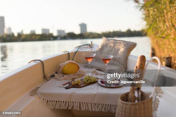 picnic set-up on the river - österreich durchblick stock-fotos und bilder