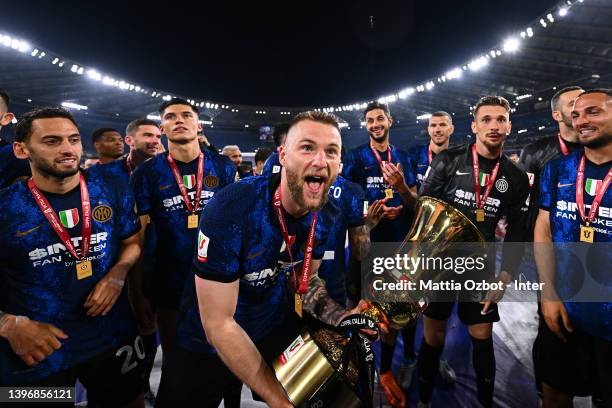 Milan Skriniar of FC Internazionale celebrate with the trophy after winning the Coppa Italia Final match between Juventus and FC Internazionale at...