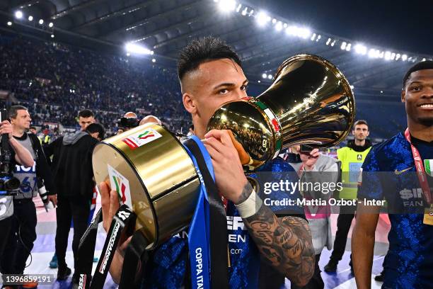 Lautaro Martinez of FC Internazionale celebrate with the trophy after winning the Coppa Italia Final match between Juventus and FC Internazionale at...