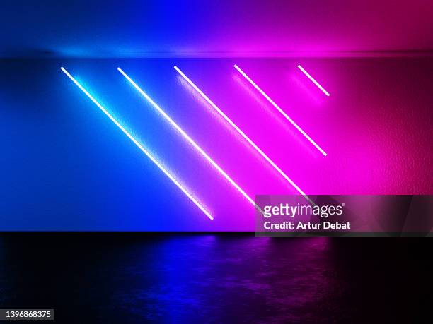digital wall with red and blue neon illumination. - installationskunst stock-fotos und bilder