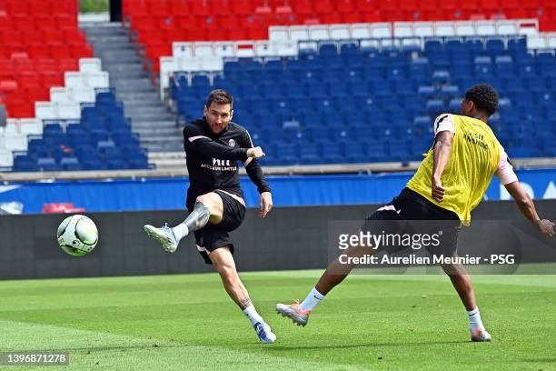 Leo Messi kicks the ball during a Paris Saint-Germain training session at Parc des Princes on May 12, 2022 in Paris, France.