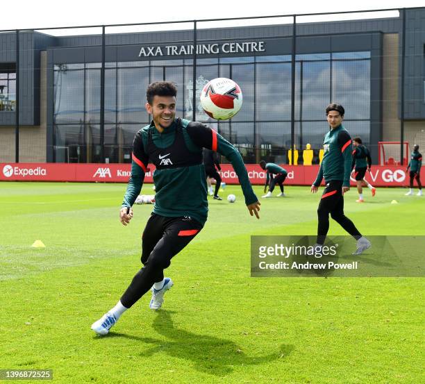 Luis Diaz and Takumi Minamino of Liverpool during a training session at AXA Training Centre on May 12, 2022 in Kirkby, England.