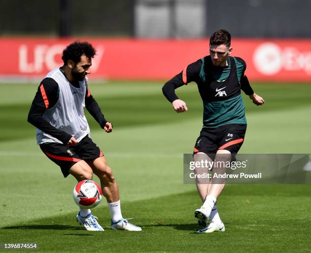 Mohamed Salah and Andy Robertson of Liverpool during a training session at AXA Training Centre on May 12, 2022 in Kirkby, England.