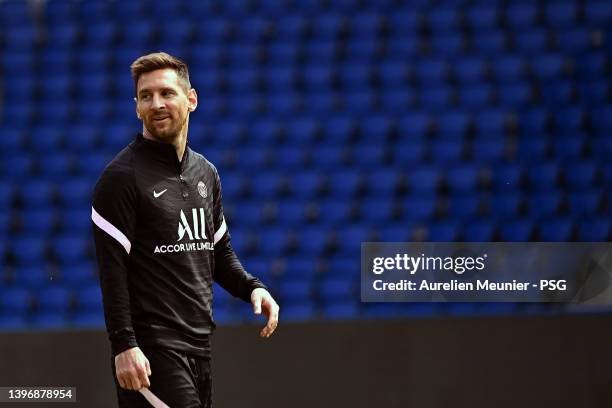 Leo Messi looks on during a Paris Saint-Germain training session at Parc des Princes on May 12, 2022 in Paris, France.