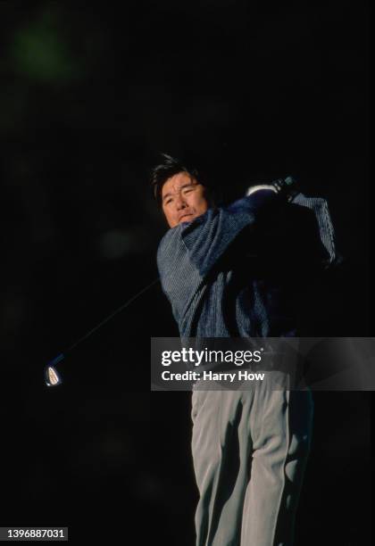 Naomichi "Joe" Ozaki from Japan follows his iron shot off the fairway during the PGA Nissan Los Angeles Open golf tournament on 27th February 1998 at...