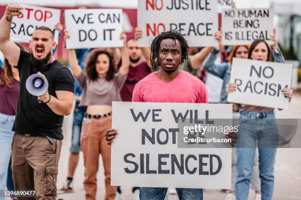 Protesting Against Rasisim 10,067 Campaign Against Racism Stock Photos, High-Res Pictures, and ...
