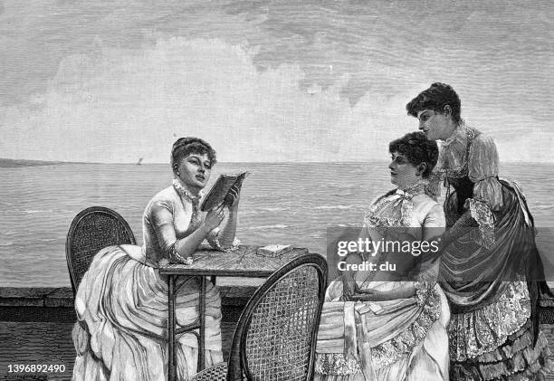 reading pleasure at the beach, 3 women sitting together - woman on beach reading stock illustrations