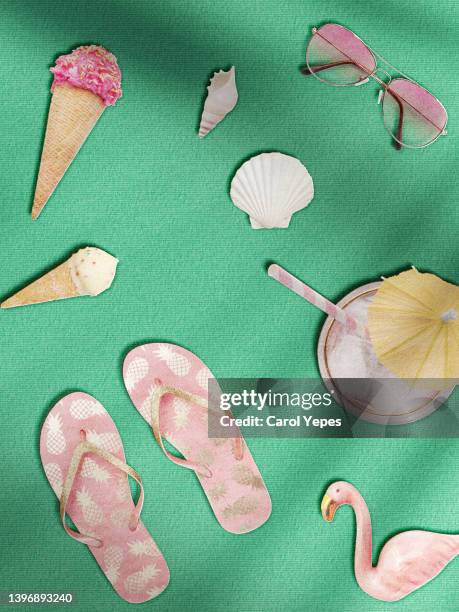digitally generated image of summer items. in paper cut flips flops, sunglasses. ice cream - beach flat lay stock pictures, royalty-free photos & images