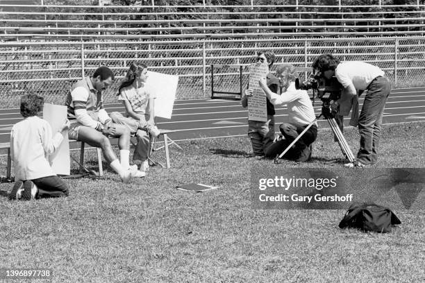 View of American baseball player Reggie Jackson and members of the crew during the filming of an episode of 'Reggie Jackson's Wide World of Sports,'...