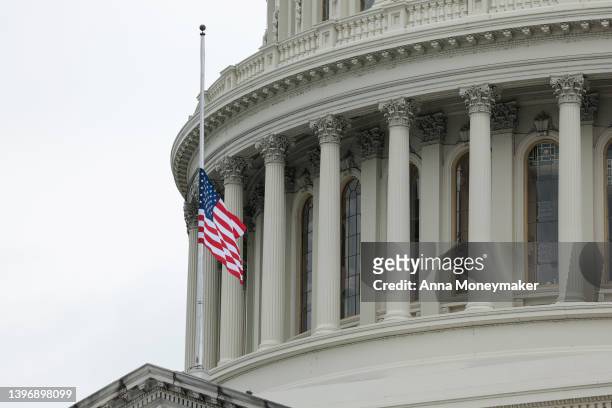 The U.S. Flag flies at half staff over the U.S. Capitol Building in Washington, DC on May 12, 2022 in Washington, DC. U.S. President Joe Biden...