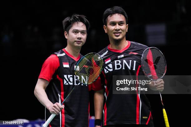 Mohammad Ahsan and Kevin Sanjaya Sukamuljo of Indonesia celebrate the victory in the Men's Double match against Liu Yuchen and Ou Xuanyi of China...