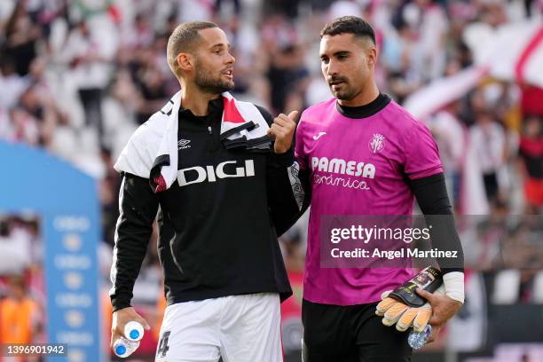 Mario Suarez of Rayo Vallecano and Sergio Asenjo of Villarreal CF interact prior to the La Liga Santander match between Rayo Vallecano and Villarreal...