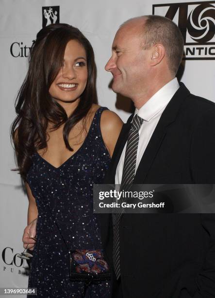 Married couple, philanthropist Orianne Collins and Pop musician Phil Collins, share a smile during City of Hope's 'Spirit of Life' gala at Cipriani,...