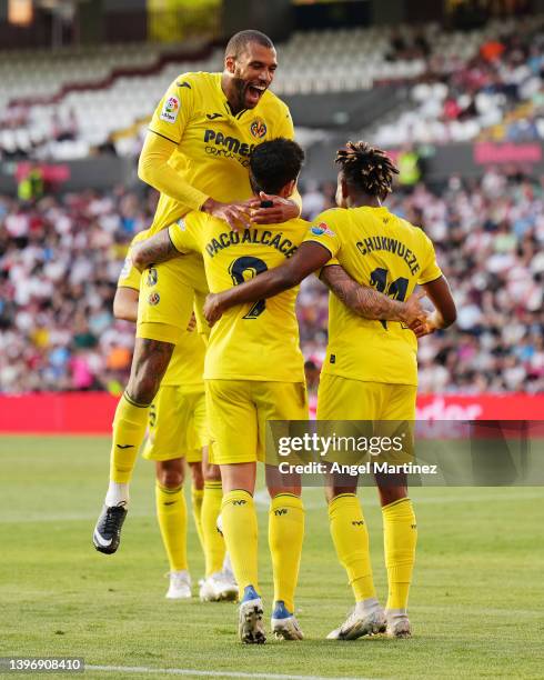 Paco Alcacer of Villarreal CF celebrates after scoring their side's third goal with Etienne Capoue and Samuel Chukwueze during the La Liga Santander...