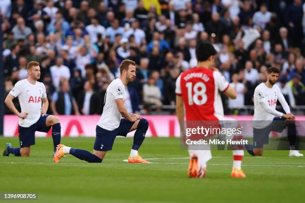 Harry Kane of Tottenham Hotspur takes a knee in support of the Black Lives Matter movement prior to the Premier League match between Tottenham...