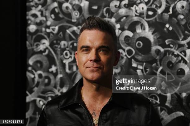 Robbie Williams attends the opening reception for the "Black And White Paintings" Exhibition by Williams Godrich, an art collaboration of Robbie...