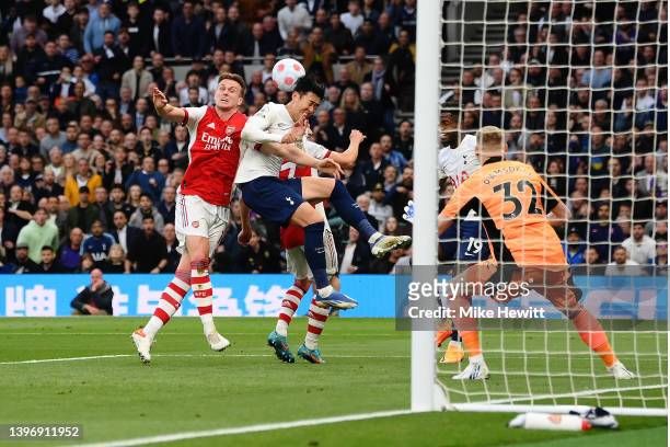 Heung-Min Son of Tottenham Hotspur is fouled by Rob Holding of Arsenal leading to a penalty being awarded during the Premier League match between...